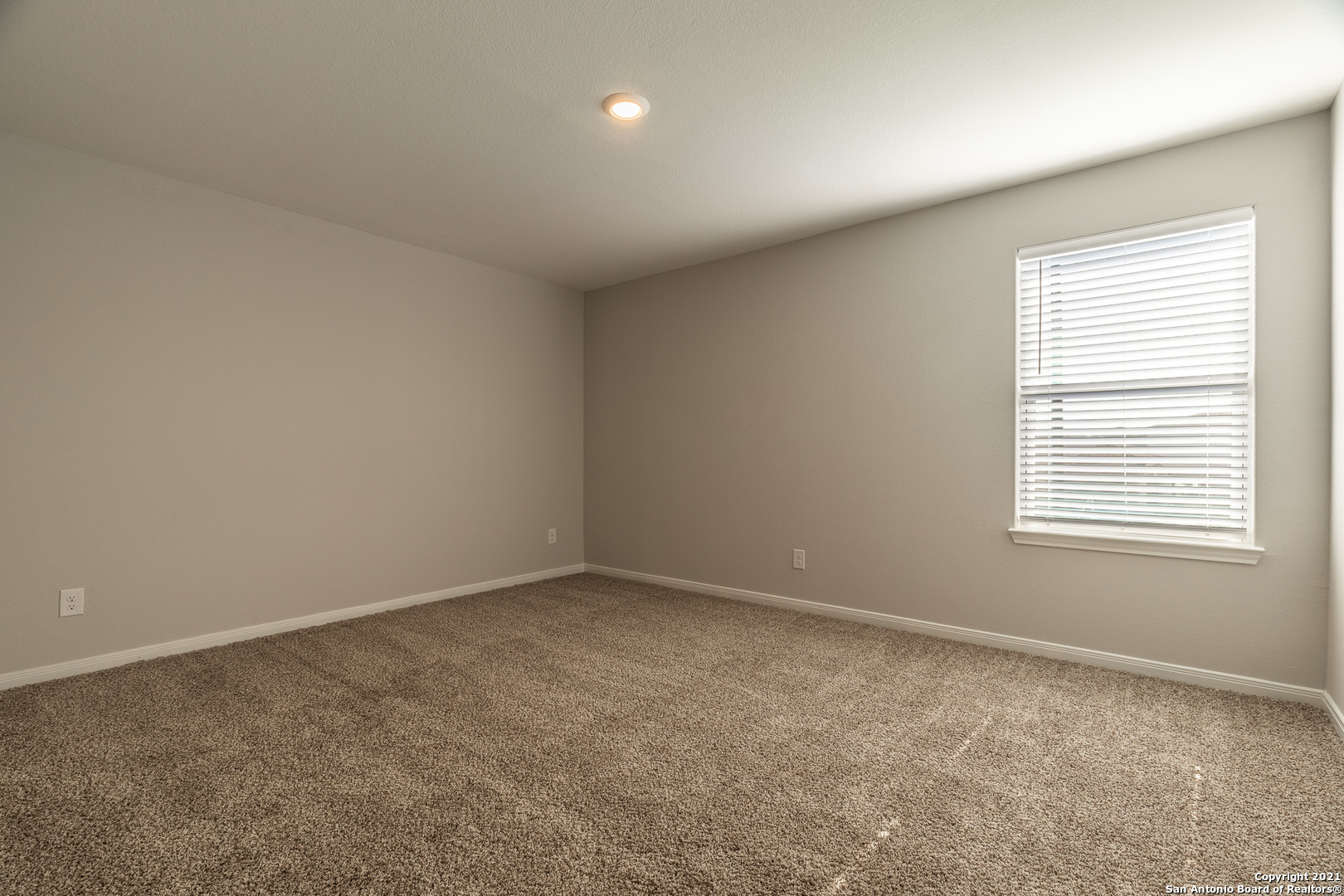9338 Espadrille Run Converse, TX 78109 - Photo 37 of 46 an empty room with a window