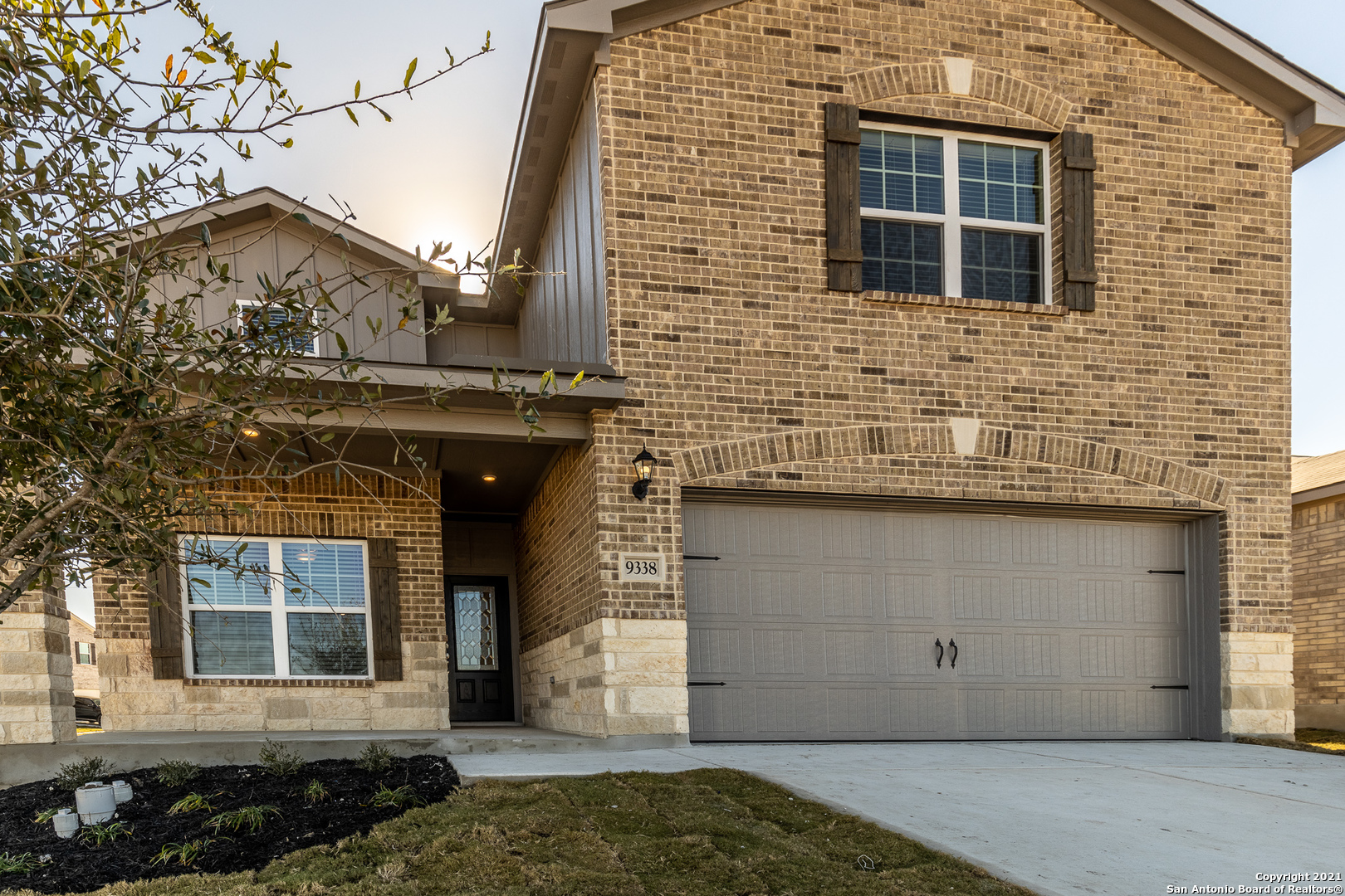 9338 Espadrille Run Converse, TX 78109 - Photo 4 of 46 a view of a brick house with many windows