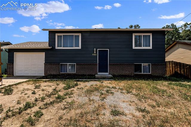 1744 Whitehall Road Colorado Springs, CO 80906 - Photo 2 of 25 Front of Home