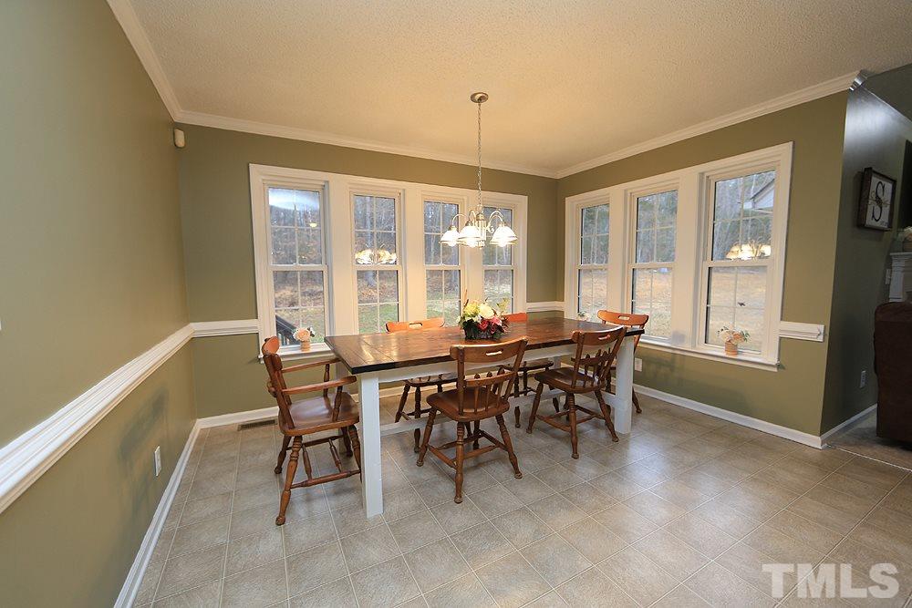 657 Thunder Road Rougemont, NC 27572 - Photo 11 of 29 a view of a dining room with furniture window and outside view