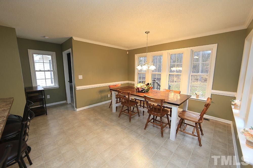 657 Thunder Road Rougemont, NC 27572 - Photo 12 of 29 a view of a dining room with furniture window and outside view