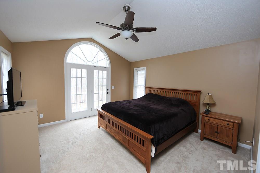 657 Thunder Road Rougemont, NC 27572 - Photo 20 of 29 a living room with a bed furniture and a window