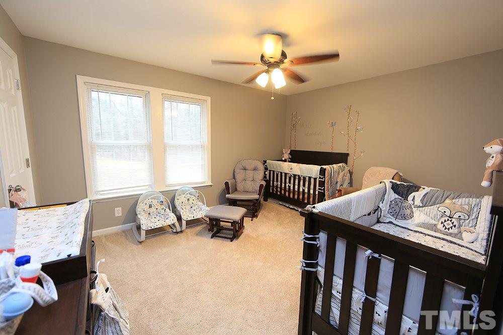 657 Thunder Road Rougemont, NC 27572 - Photo 24 of 29 a bedroom with furniture and a window