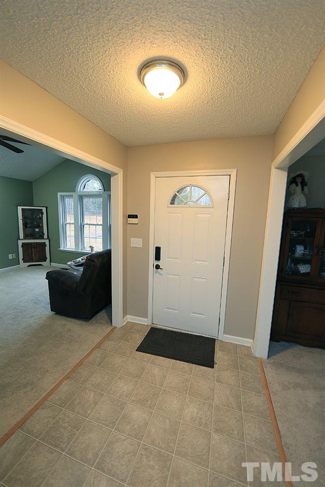 657 Thunder Road Rougemont, NC 27572 - Photo 5 of 29 a view of a livingroom with a kitchen