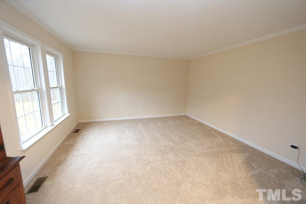 657 Thunder Road Rougemont, NC 27572 - Photo 7 of 29 an empty room with a window