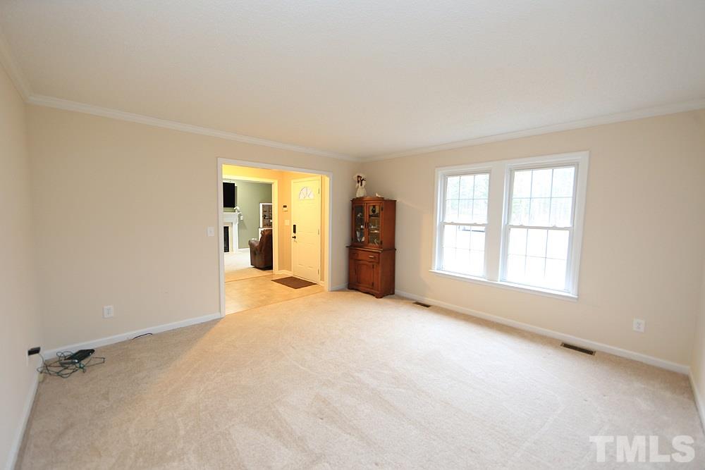 657 Thunder Road Rougemont, NC 27572 - Photo 8 of 29 an empty room with windows and closet