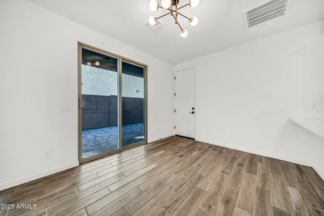 a kitchen with cabinets oven and a dishwasher