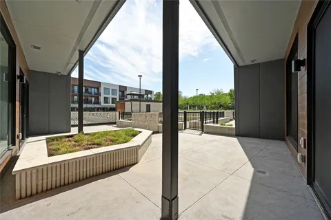 a view of a porch with a furniture