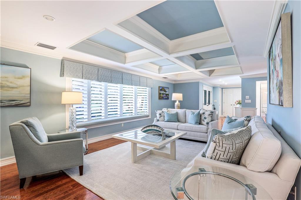 635 Anchor Rode Drive Naples, FL 34103 - Photo 12 of 50 a living room with furniture and a large window