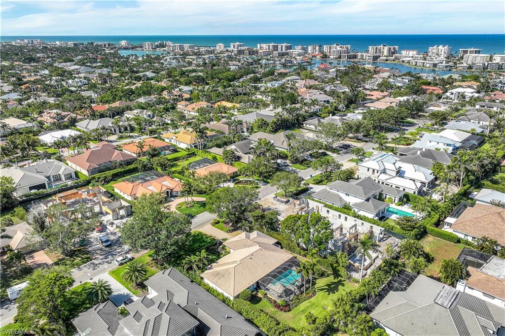 635 Anchor Rode Drive Naples, FL 34103 - Photo 47 of 50 an aerial view of a house with a yard