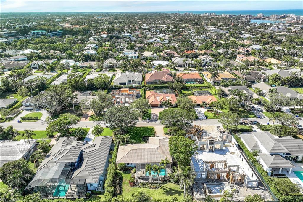 635 Anchor Rode Drive Naples, FL 34103 - Photo 48 of 50 an aerial view of residential houses with city view