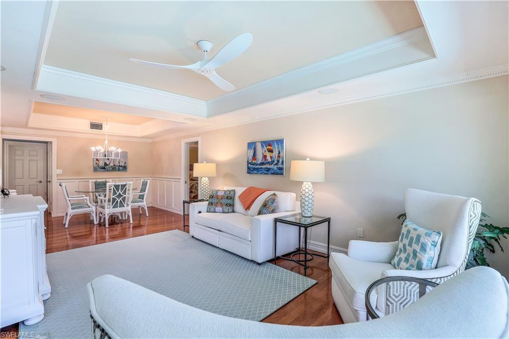635 Anchor Rode Drive Naples, FL 34103 - Photo 7 of 50 a living room with furniture and a table