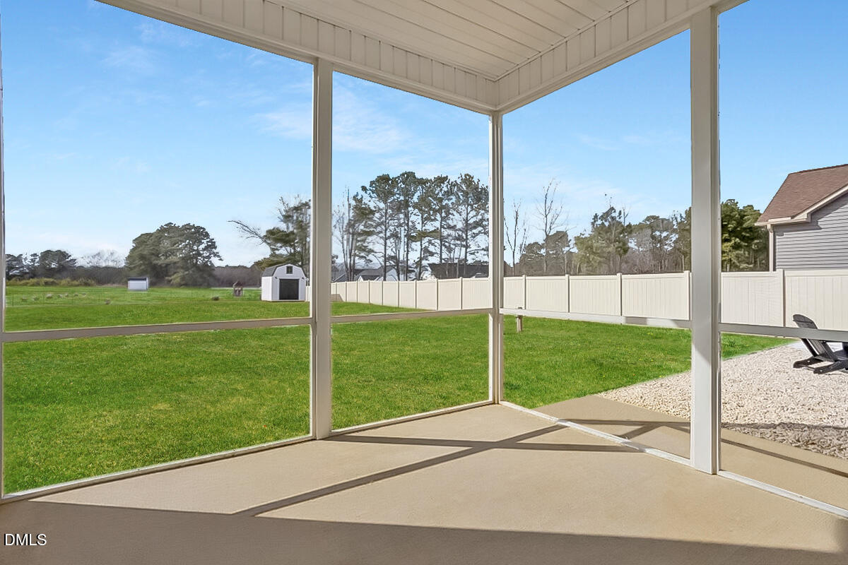 68 Bodacious Lane Benson, NC 27504 - Photo 5 of 39 a view of a porch and yard