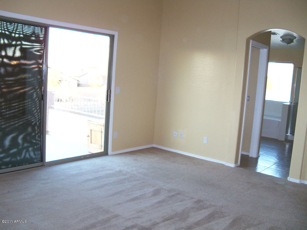 4418 West Darrel Road Laveen, AZ 85339 - Photo 14 of 15 Master Bedroom and Bath with Balcony