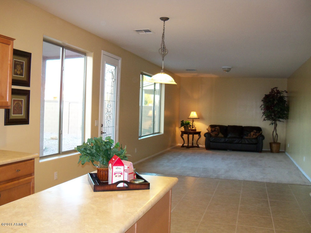 4418 West Darrel Road Laveen, AZ 85339 - Photo 6 of 15 Kitchen and Family Room