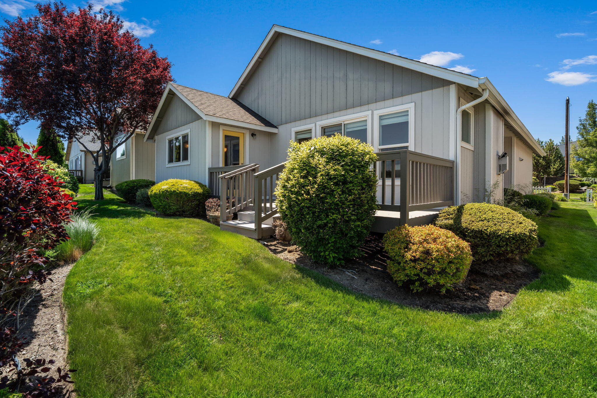 3714 Southwest 29th Street Redmond, OR 97756 - Photo 20 of 21 a front view of house with garden and trees