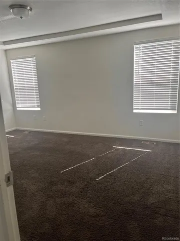 a view of a room that has a window in it
