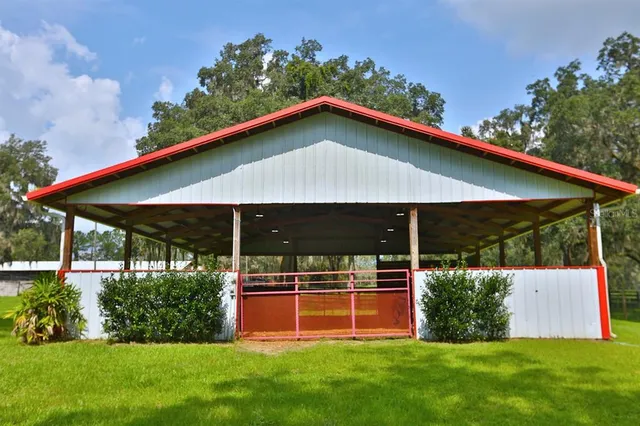 a view of a porch with wooden floor