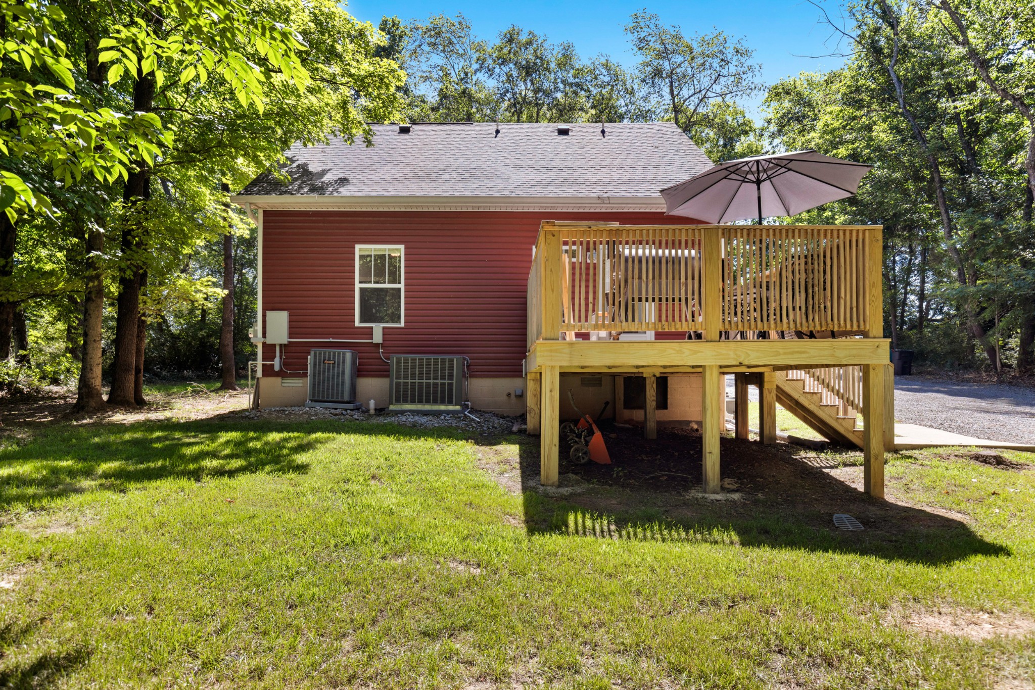 115 North Adams Street Adams, TN 37010 - Photo 43 of 44 a view of a house with a yard patio and fire pit
