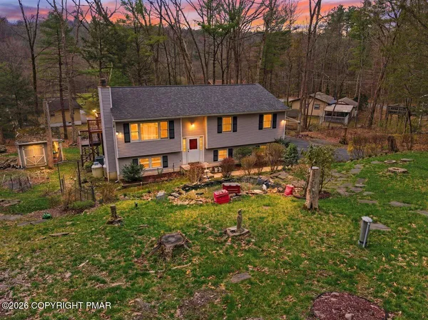a house view with a outdoor space