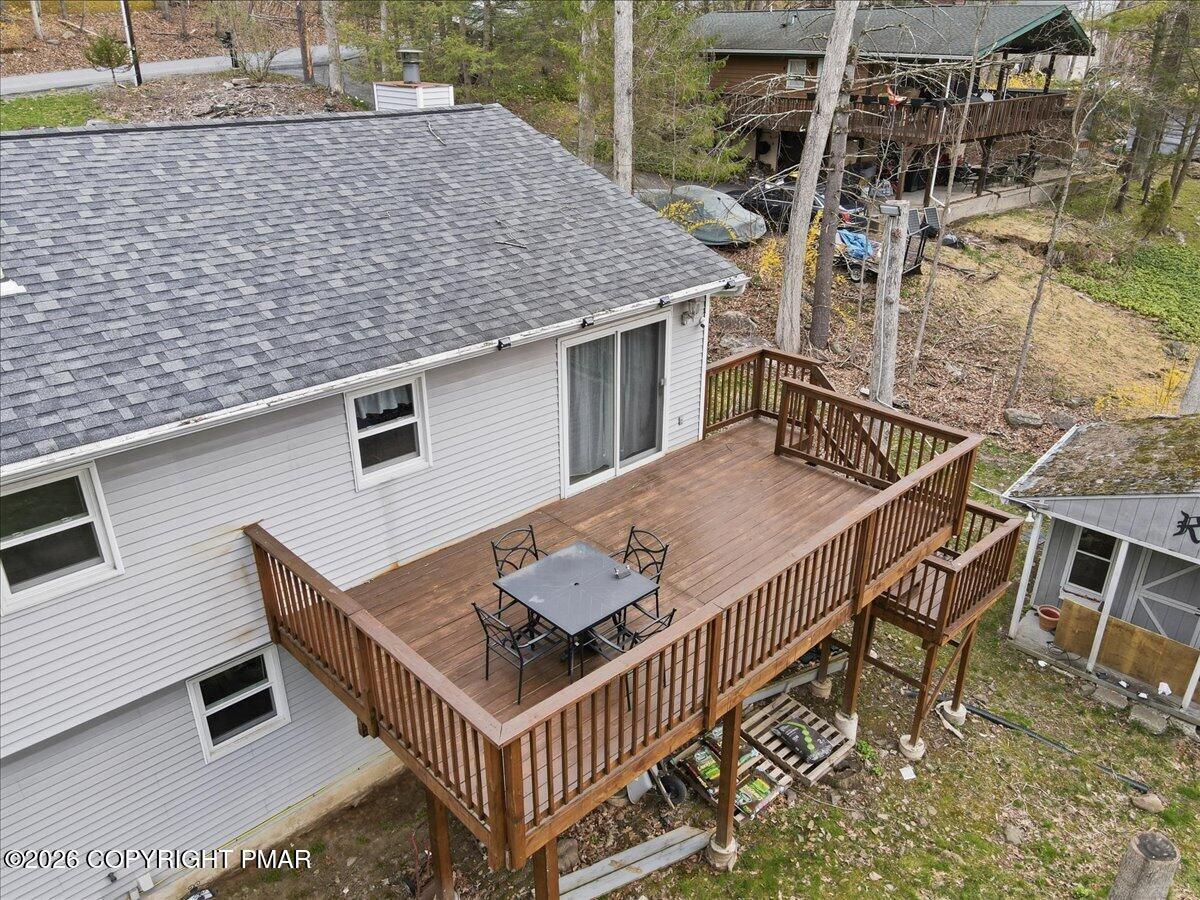 606 Rimrock Road Bartonsville, PA 18321 - Photo 26 of 36 a view of a roof deck with furniture