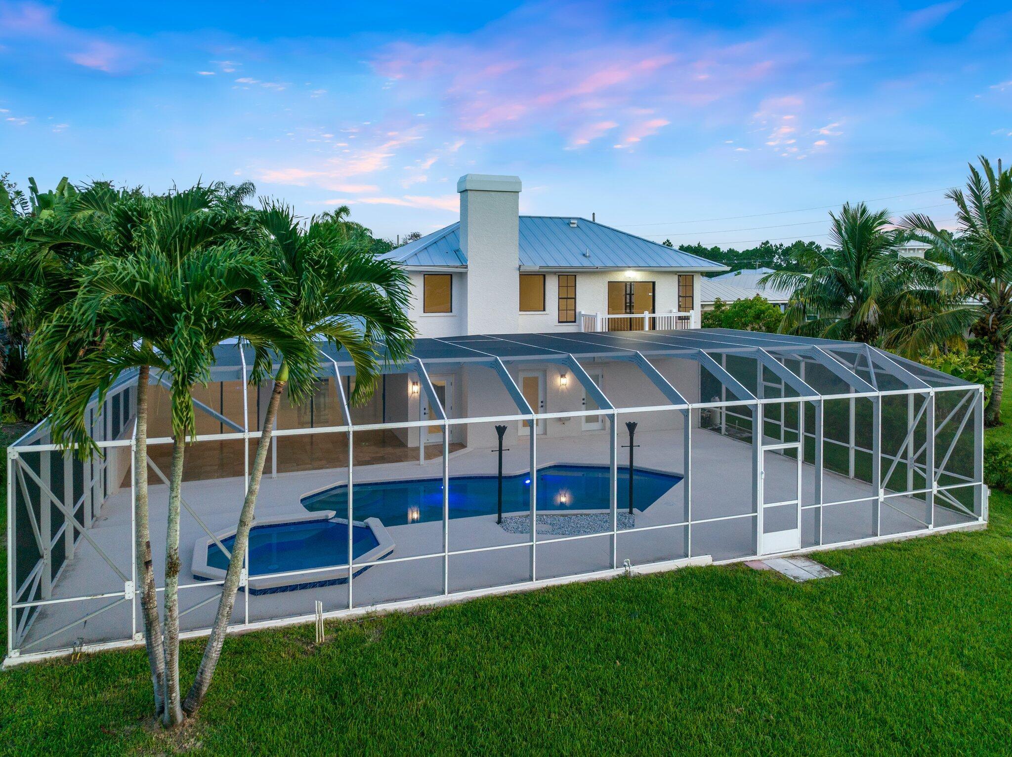163 Southeast Osprey Ridge Port St. Lucie, FL 34984 - Photo 93 of 111 twlight back