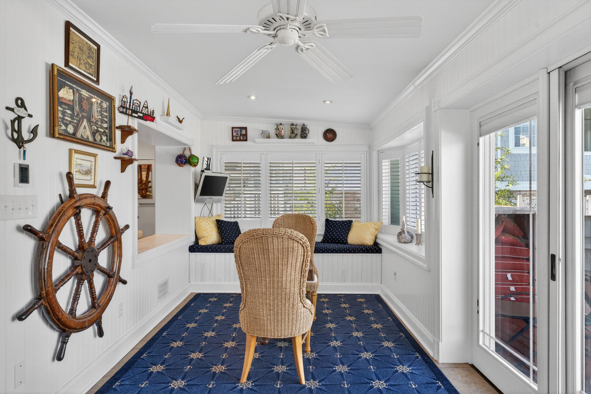 3500 Galloway Road Baltimore, MD 21220 - Photo 54 of 92 Cozy coastal sunroom retreat with natural light.