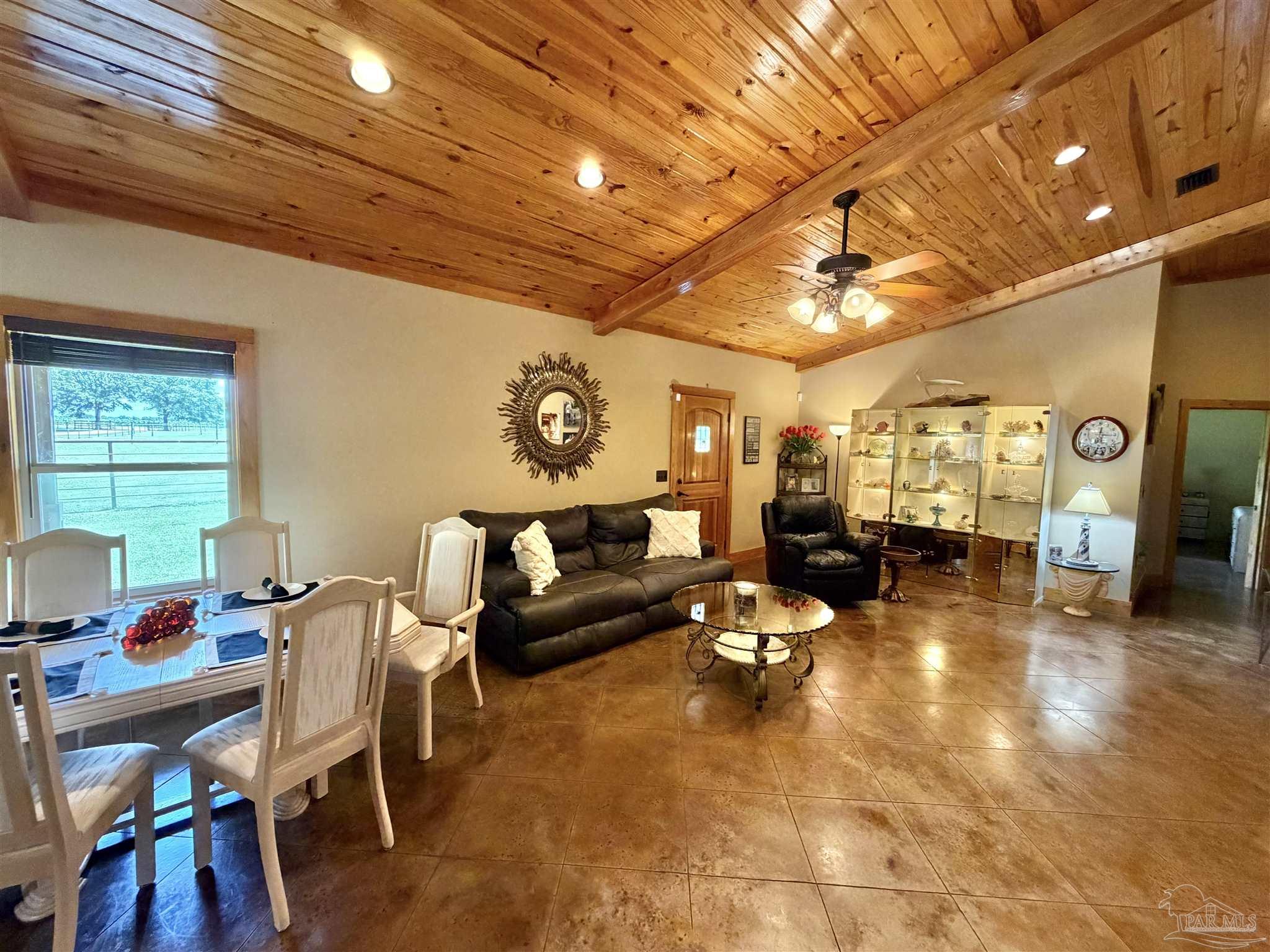 145 Tower Road Uriah, AL 36480 - Photo 8 of 72 a living room with furniture and a chandelier