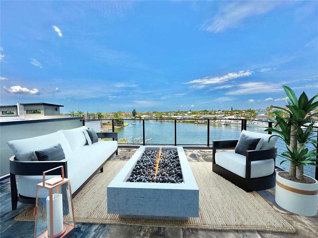 777 Gran Kaymen Way Apollo Beach, FL 33572 - Photo 26 of 30 a outdoor living space with furniture and city view