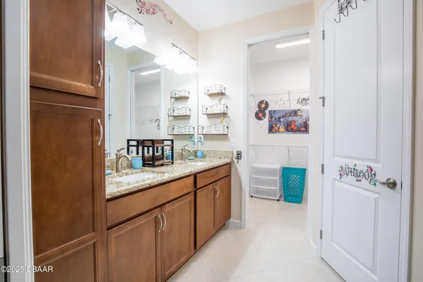 a hallway with cabinets and a wooden floor