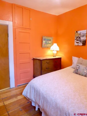 a bathroom with a shower curtain and a sink