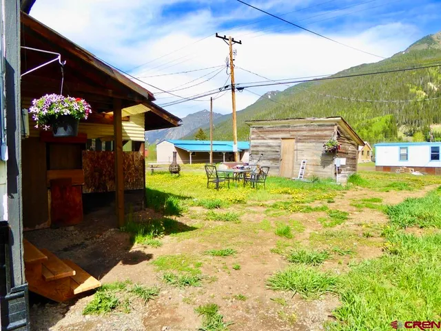 a picture of a bench in front of door
