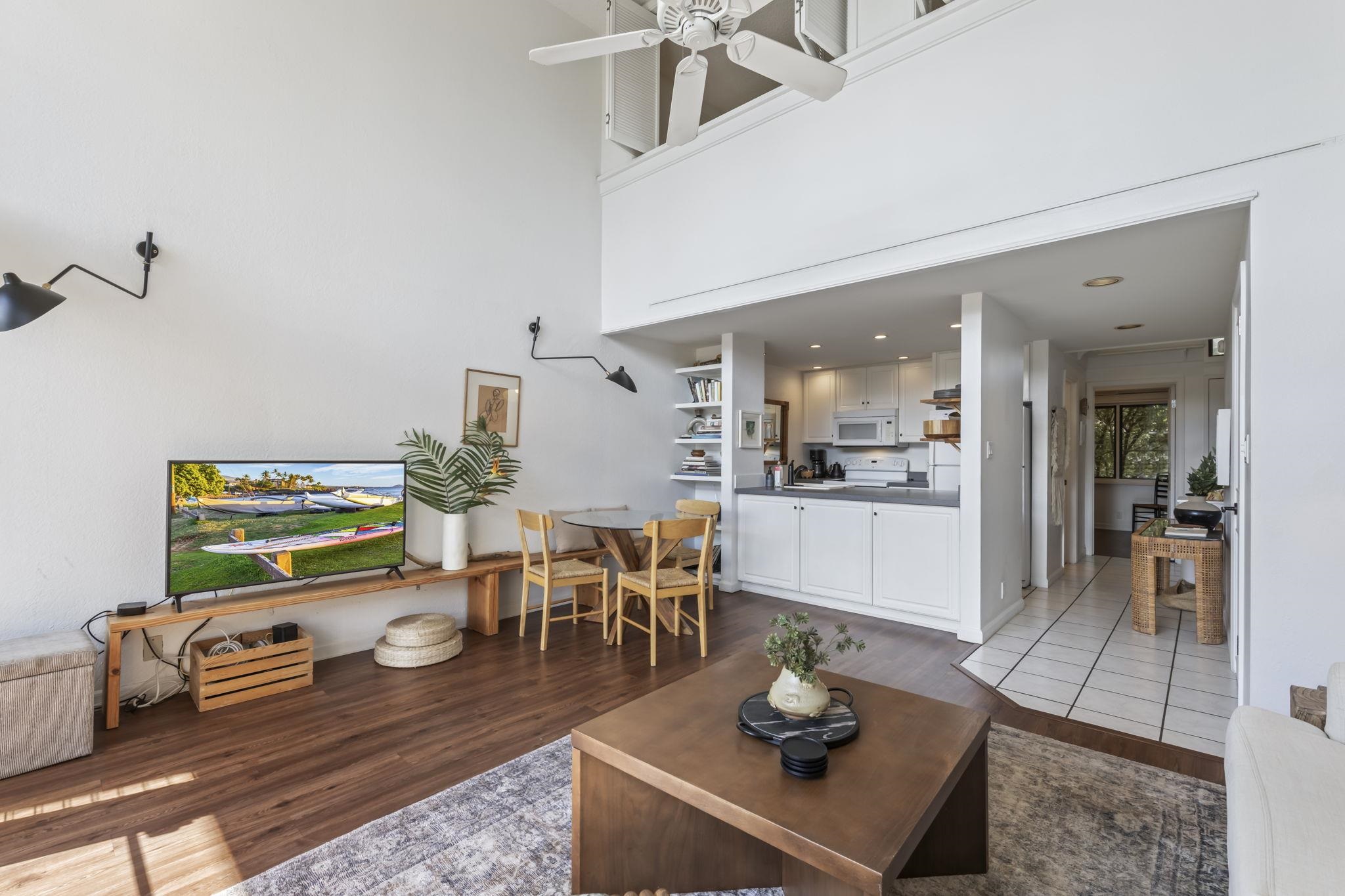 1299 Uluniu Road, Unit G202 Kihei, HI 96753 - Photo 11 of 46 a living room with furniture and wooden floor
