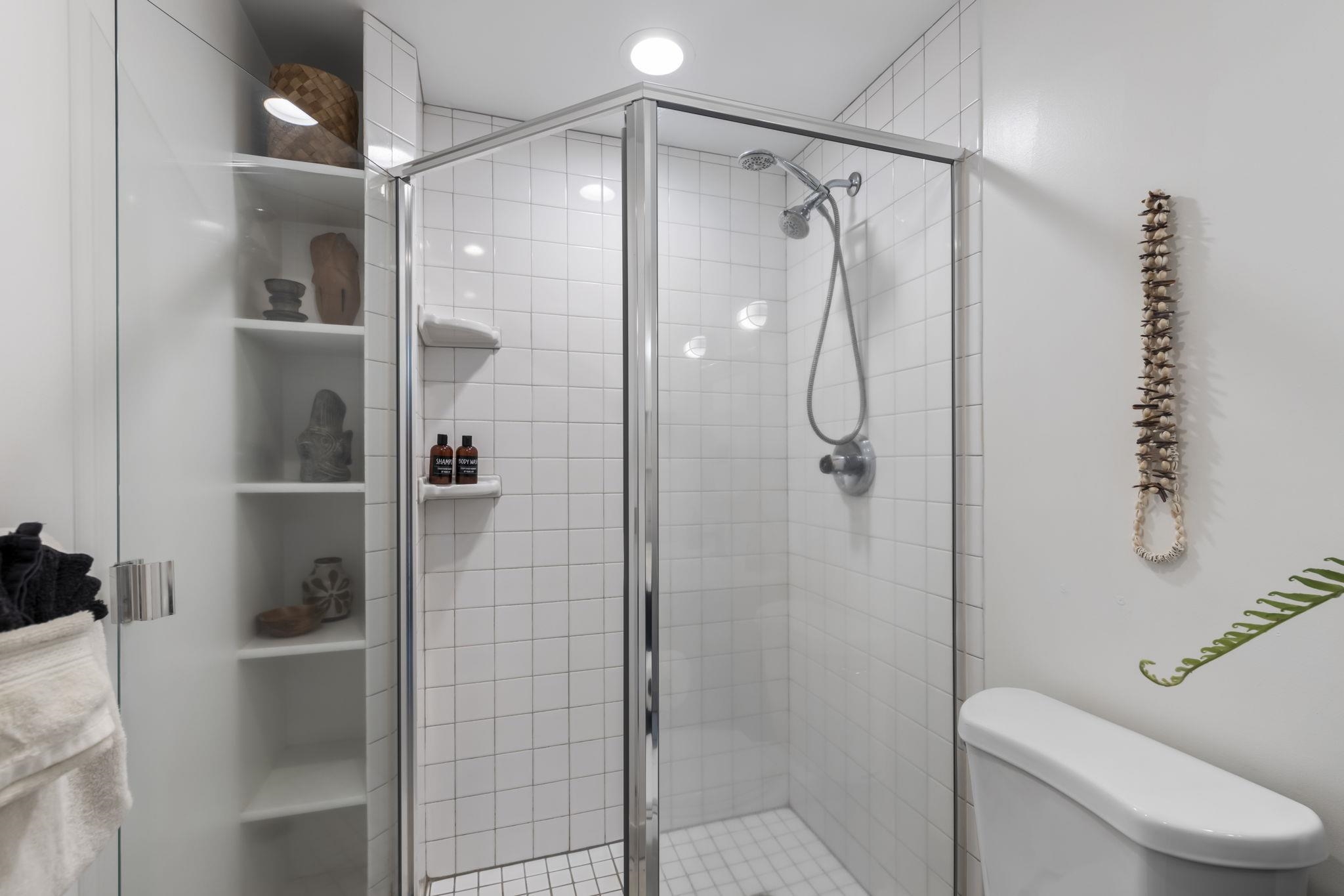 1299 Uluniu Road, Unit G202 Kihei, HI 96753 - Photo 24 of 46 a bathroom with a shower and a toilet