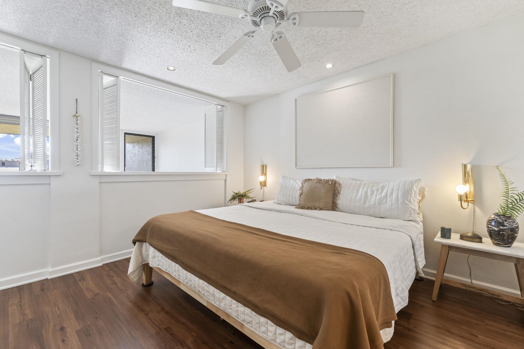 1299 Uluniu Road, Unit G202 Kihei, HI 96753 - Photo 29 of 46 a bedroom with bed and window