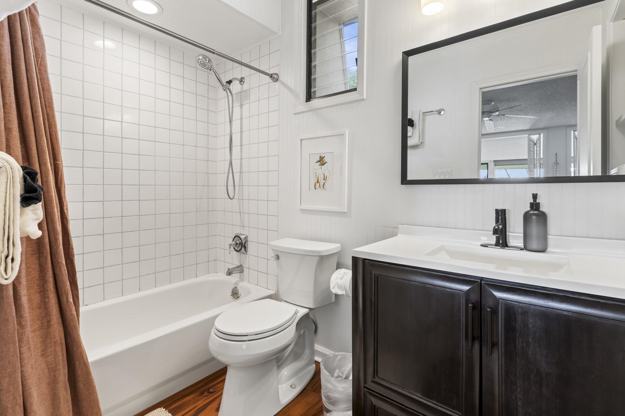 1299 Uluniu Road, Unit G202 Kihei, HI 96753 - Photo 30 of 46 a bathroom with a sink a toilet and shower