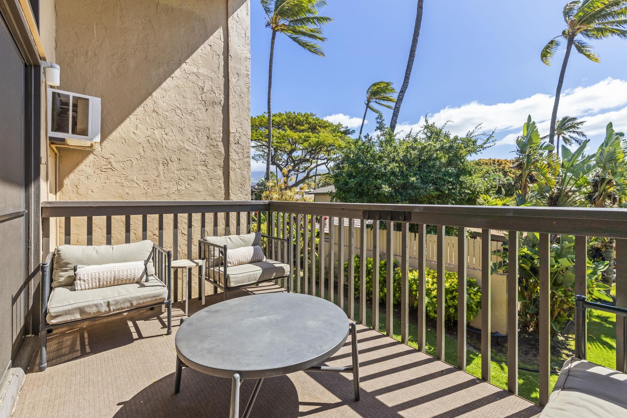 1299 Uluniu Road, Unit G202 Kihei, HI 96753 - Photo 4 of 46 a view of a chairs and table in the balcony