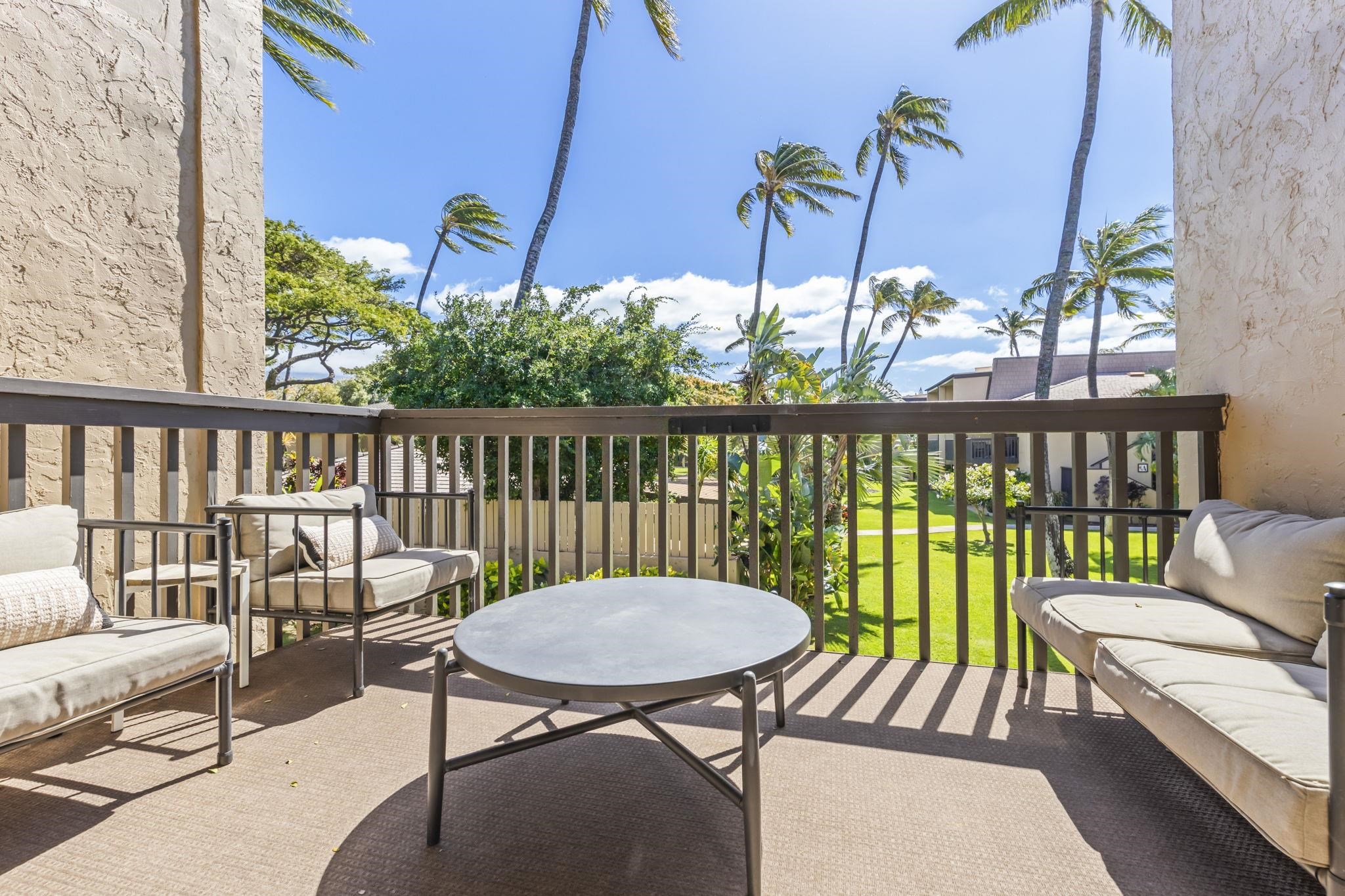 1299 Uluniu Road, Unit G202 Kihei, HI 96753 - Photo 5 of 46 a view of a chairs and table in patio
