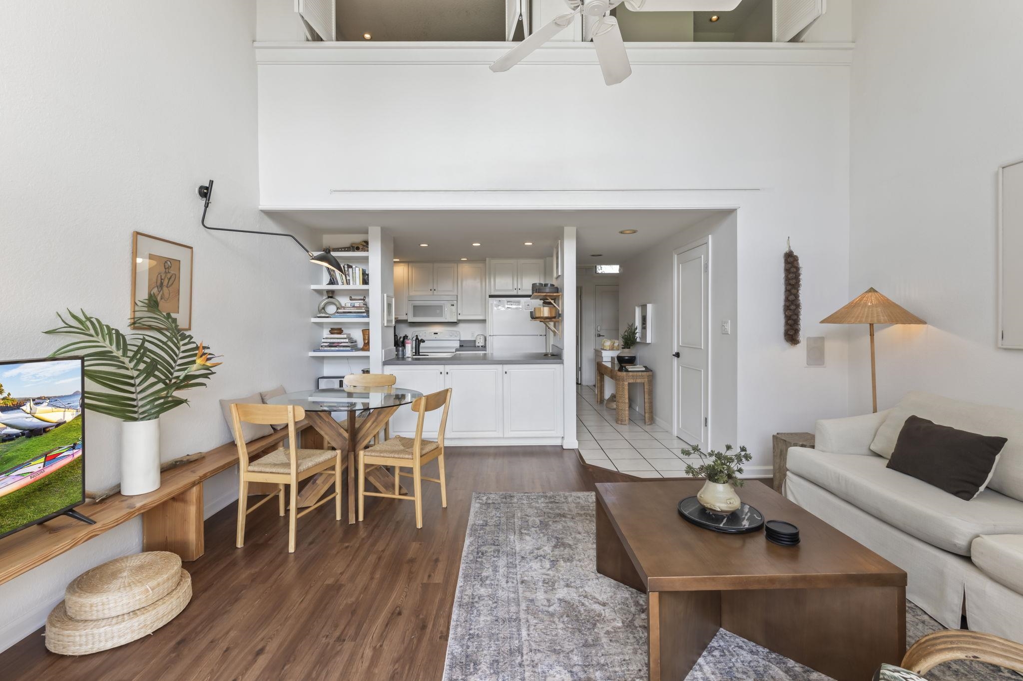 1299 Uluniu Road, Unit G202 Kihei, HI 96753 - Photo 7 of 46 a living room with furniture and wooden floor