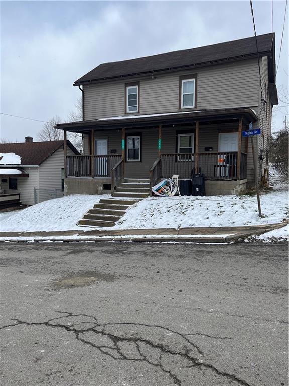 a view of a house with a patio
