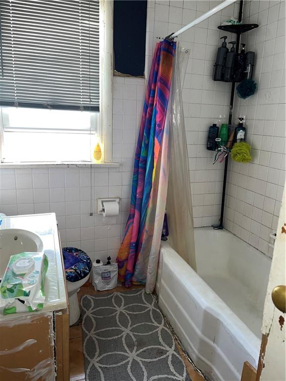 119 Heim Avenue Butler, PA 16001 - Photo 8 of 13 a bathroom with a bathtub and shower