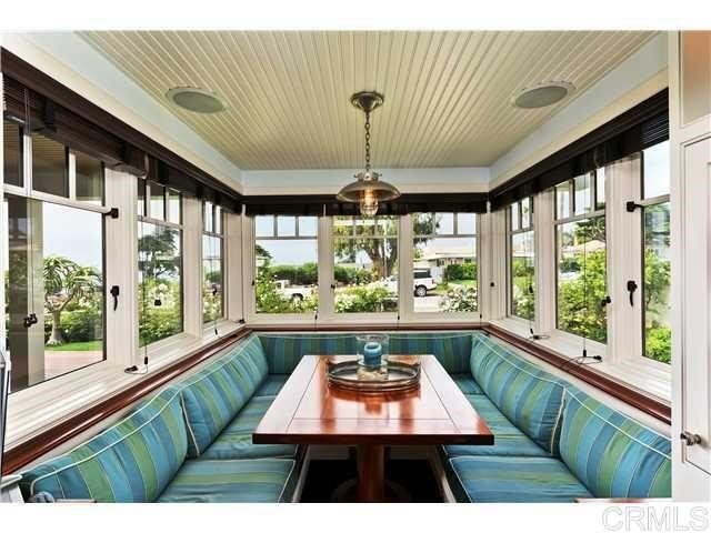 111 10th Street Del Mar, CA 92014 - Photo 12 of 23 a room with furniture and large windows