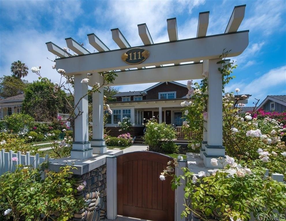 111 10th Street Del Mar, CA 92014 - Photo 22 of 23 front view of a house with a yard
