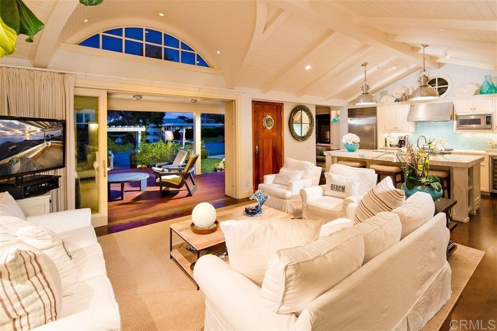 111 10th Street Del Mar, CA 92014 - Photo 5 of 23 a living room with furniture and a large window