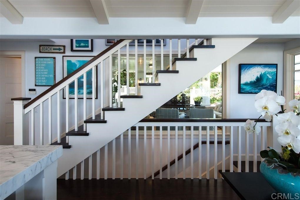 111 10th Street Del Mar, CA 92014 - Photo 9 of 23 a view of entryway and hall with wooden floor