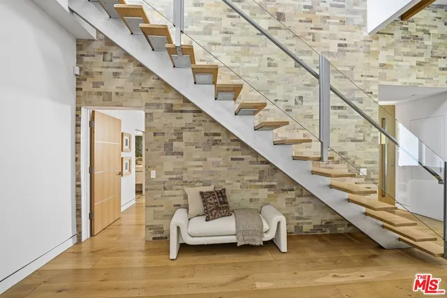 a view of entryway with wooden floor