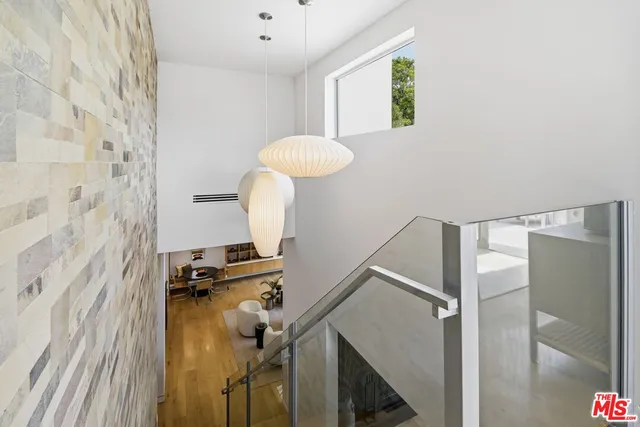 a view of a hallway with closet