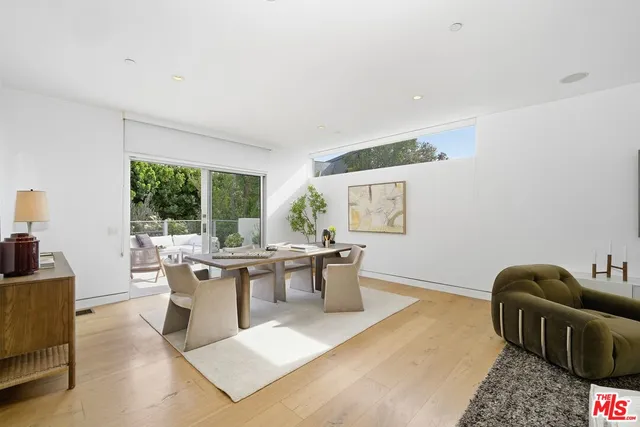 a view of a living room and dining room