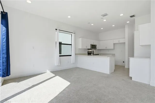 a view of a city with an ocean view