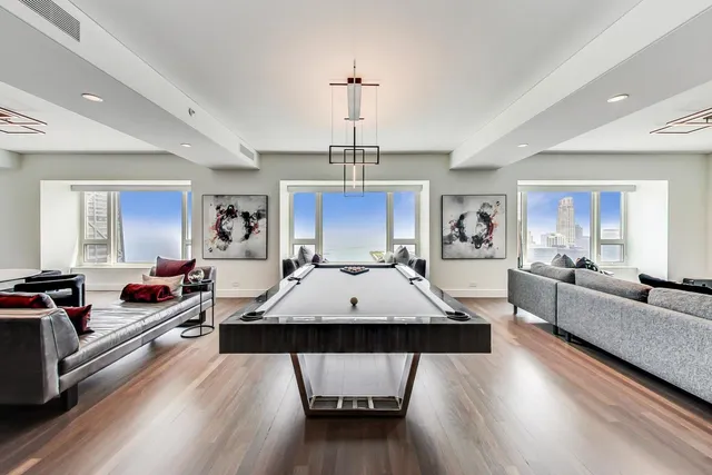 a living room with furniture and window
